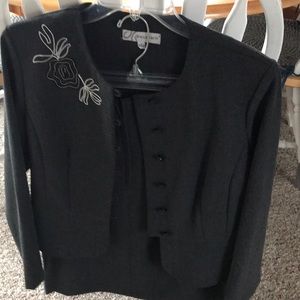 Dark get skirt suit.